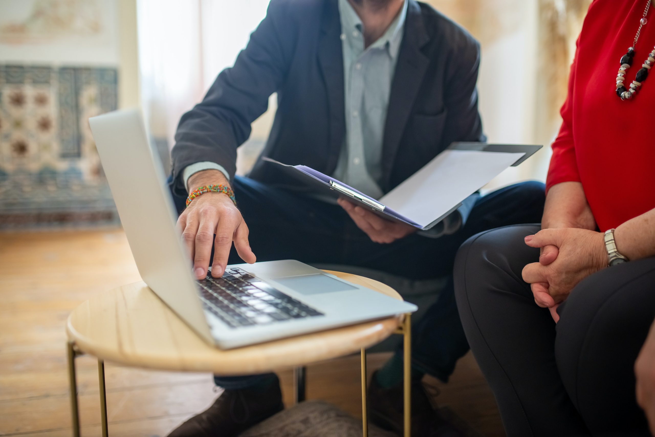 Insurance agent having a consultation with a client about weekend and vacation rental insurance